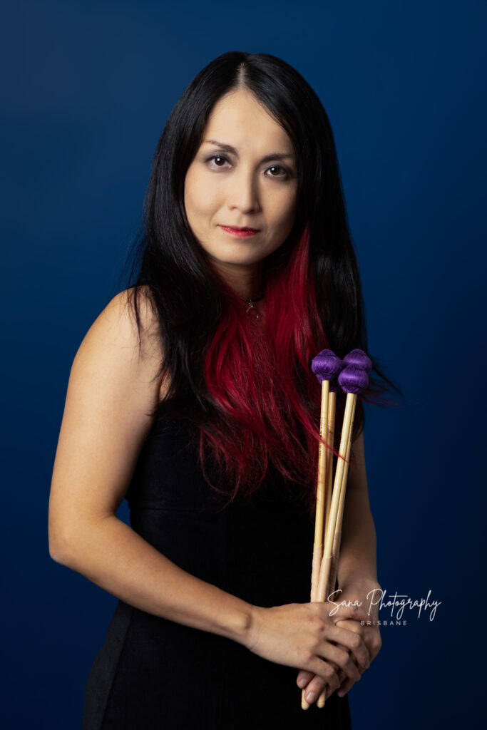 business portrait with plain colour background